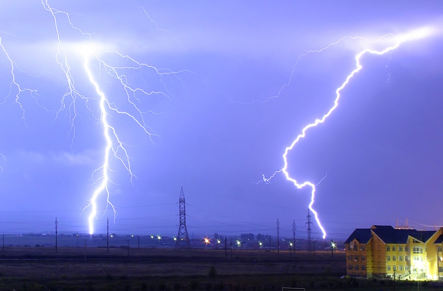 Lightning branching across the night sky over Oradea, Romania