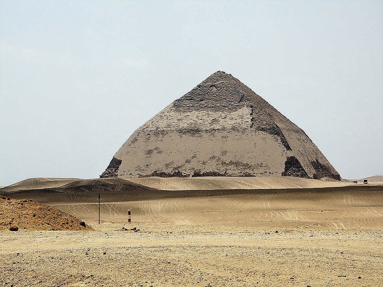 The Bent Pyramid at Dahshur, whose sides change angle sharply about halfway up.